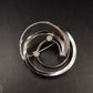 Silberfarbene Brosche im Spiral-Design – Eleganter Vintage-Schmuck mit Stein