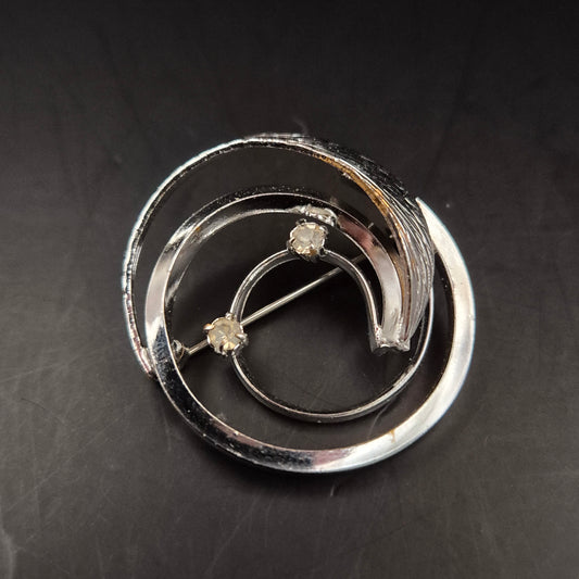 Silberfarbene Brosche im Spiral-Design – Eleganter Vintage-Schmuck mit Stein