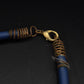 Markante Kreuz Halskette in Gold-Optik – Blaues Stein-Element