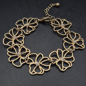 Elegantes Blumen Armband in Gold-Optik – Florales Design mit Strass