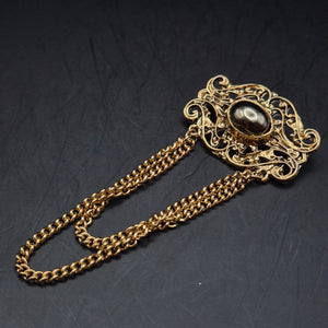 Edle Vintage Brosche mit Kette – Barockes Design in Gold Optik