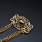 Edle Vintage Brosche mit Kette – Barockes Design in Gold Optik