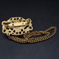 Edle Vintage Brosche mit Kette – Barockes Design in Gold Optik