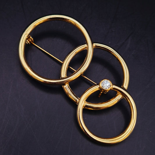 Elegante Brosche mit ineinandergreifenden Ringen – Goldfarbenes Vintage Design