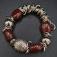 Statement Armband mit Roten Schmucksteinen – Extravagantes Design