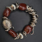 Statement Armband mit Roten Schmucksteinen – Extravagantes Design