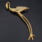 Elegante Flamingo Brosche in Gold-Optik mit funkelnden Steinen