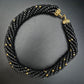 Elegante Schwarze Perlen Kette – Gedrehtes Design mit Goldakzenten