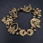 Charmantes TOFA Damen Armband – Vintage Engel & Herz Design in Goldoptik