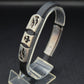 Modernes Herren Armband – Schwarzes Kautschuk mit Tribal-Elementen