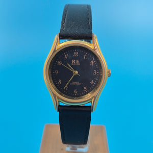 Klassische RE WATCH Damen Uhr – Goldfarbenes Gehäuse mit schwarzem Zifferblatt