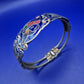 Antikes Cloisonné Armreif – Bunte Schmetterlinge auf Blau