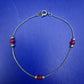 Elegantes Damen Armband mit roten Perlen – Silberfarbenes Design