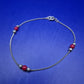 Elegantes Damen Armband mit roten Perlen – Silberfarbenes Design