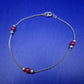Elegantes Damen Armband mit roten Perlen – Silberfarbenes Design