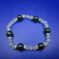 Titel Elegantes Damen Armband mit grünen Perlen und Glitzer-Akzenten
