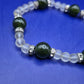 Titel Elegantes Damen Armband mit grünen Perlen und Glitzer-Akzenten