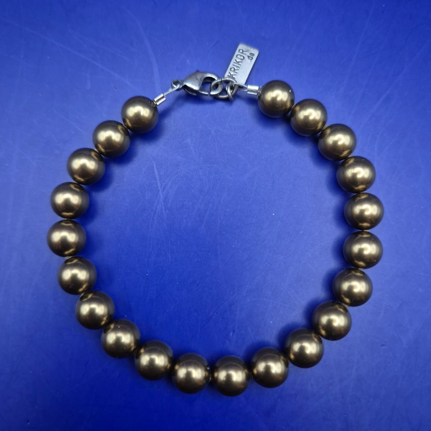 Elegantes Krikor Perlen Armband – Bronze Schimmer & Deutsche Handarbeit