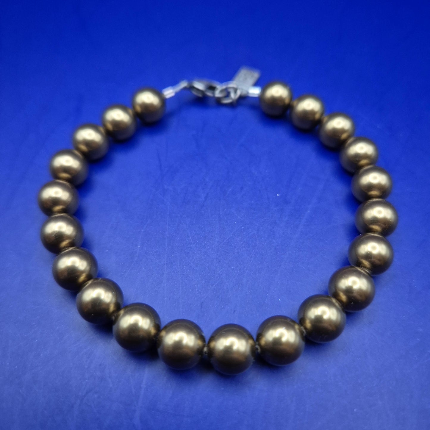 Elegantes Krikor Perlen Armband – Bronze Schimmer & Deutsche Handarbeit
