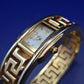 Elegante LDADPR Damen Uhr – Goldfarbenes Bangle-Design mit Mäander-Muster