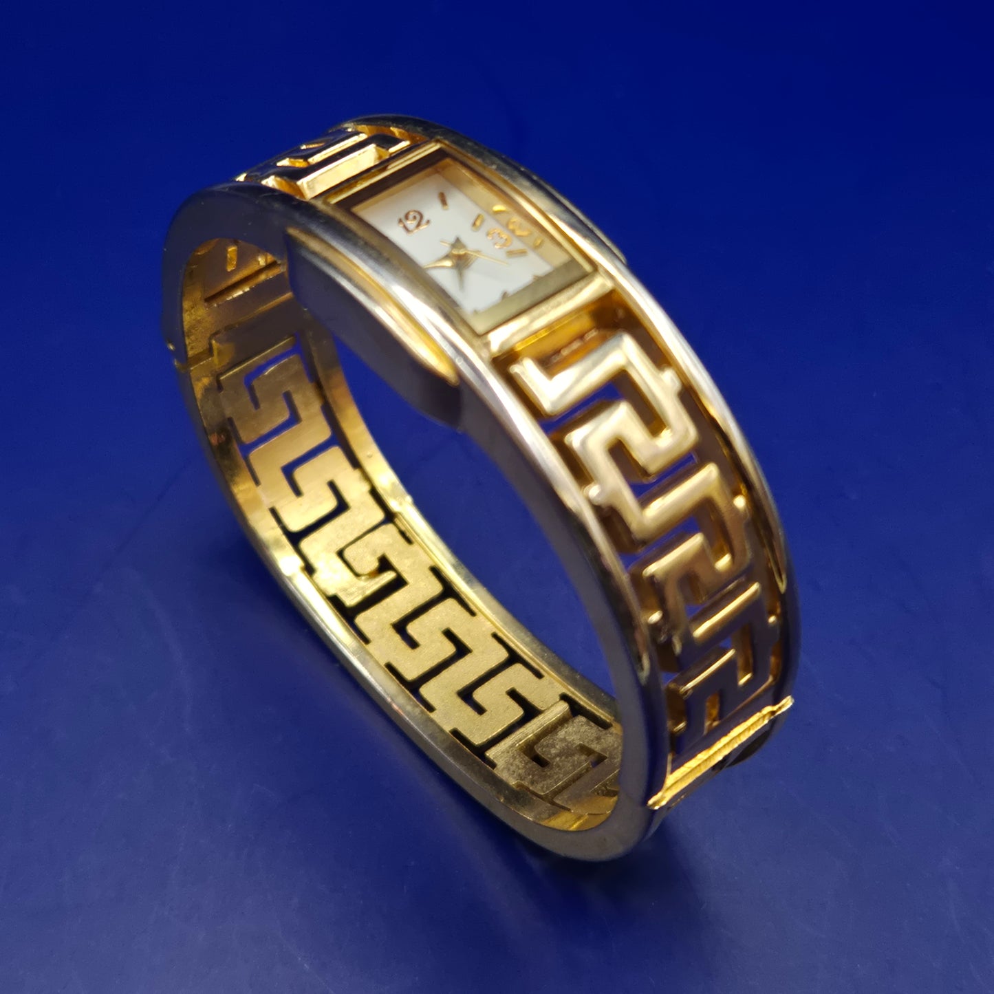 Elegante LDADPR Damen Uhr – Goldfarbenes Bangle-Design mit Mäander-Muster