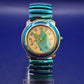 Auffällige Jean Paul Quarz Uhr – Retro-Stil mit blauem Stretchband