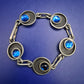 Vintage Løgeskov Tin Denmark Armband – Mid Century Modern mit blauen Steinen