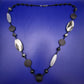 Moderne Statement Kette – Stilvoller Mix aus Holz- und Kunstharzelementen