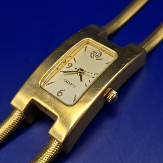 Elegante Damen Uhr – Goldenes Schlangenarmband & Vintage-Stil