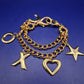 Charmantes Goldfarbenes Bettelarmband – Verspielte Symbole für Damen