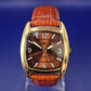 Stilvolle MC Herren Uhr – Elegantes Tonneau-Design in Braun & Gold