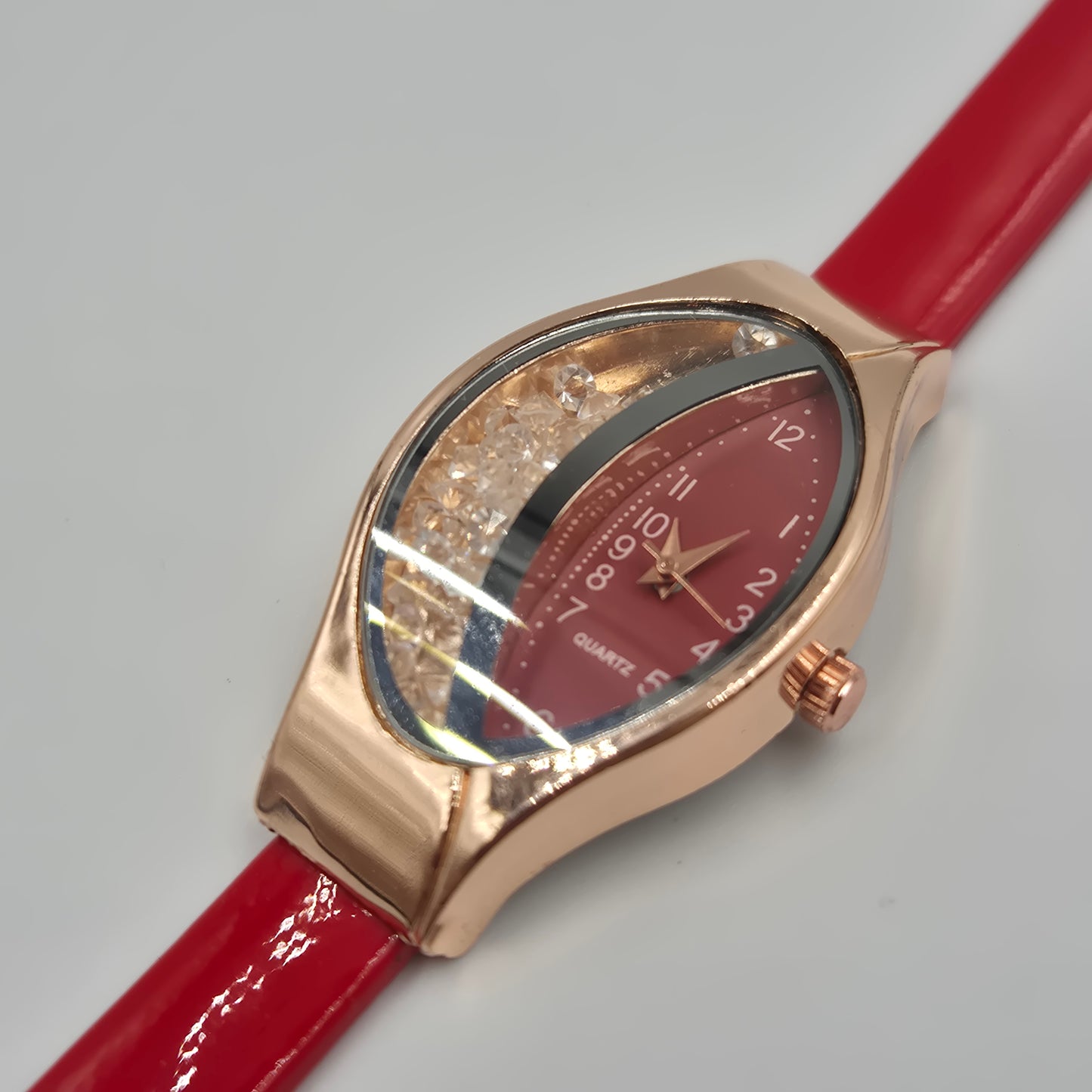 Moderne Damen Uhr mit beweglichen Steinen – Rotes Design