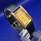 Klassische TCM Damen Uhr in Gold & Schwarz – Elegantes Rechteck Design