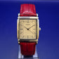 Elegante TCM Damen Uhr – Klassisches Design mit rotem Lederband