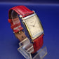 Elegante TCM Damen Uhr – Klassisches Design mit rotem Lederband