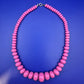 Modische Damen Kette in leuchtendem Pink – Stylischer Vintage Look