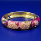 Farbenfroher Damen Armreif mit Blumenmuster und Schmucksteinen