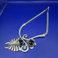 Auffällige Damen Uhr Kette in Silber-Optik mit schwarzen Steinen