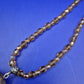 Elegante Damen Kette mit braun facettierten Perlen und Anhänger