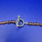 Elegante Damen Kette mit braun facettierten Perlen und Anhänger