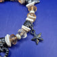 Charmantes Perlen Armband mit verspielten Motiv Anhängern – Boho Stil