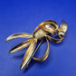 Elegante Vintage Brosche Goldfarben Wellen Design