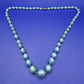 Elegante Vintage Perlenkette mit Verlauf in Pastellblau