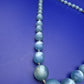 Elegante Vintage Perlenkette mit Verlauf in Pastellblau