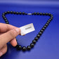 Klassische schwarze Perlenkette mit Verlauf