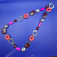 Statementkette mit geometrischen Elementen Pink Orange Braun