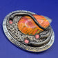 Auffällige Vintage Brosche mit schillerndem Glas-Cabochon und Schmucksteinen