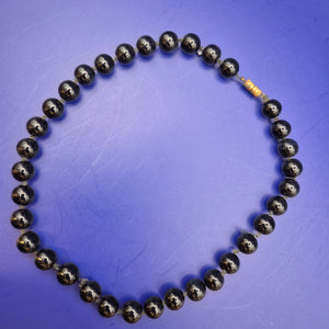 Elegante Vintage Perlenkette in glänzendem Schwarz