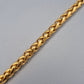Goldfarbenes Panzerarmband Weizenmuster Vintage Stil