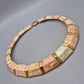 Elegante Vintage Kette mit Steinsegmenten und Goldakzenten
